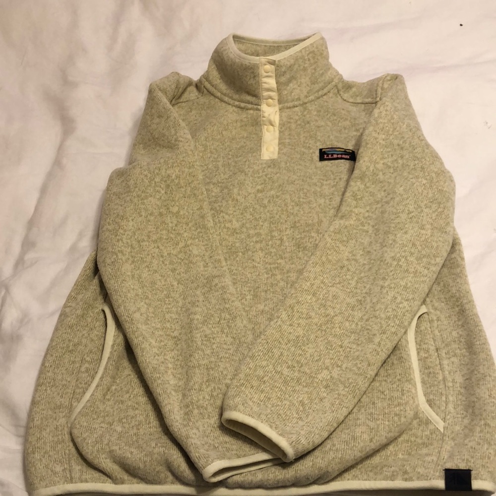 LL Bean sweater with snap neck closure.